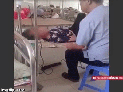 Phẫn nộ clip chồng thẳng tay tát vợ đang nằm trên giường bệnh rồi quát lớn: 'Mày hành tao suốt từ đêm qua đến giờ'