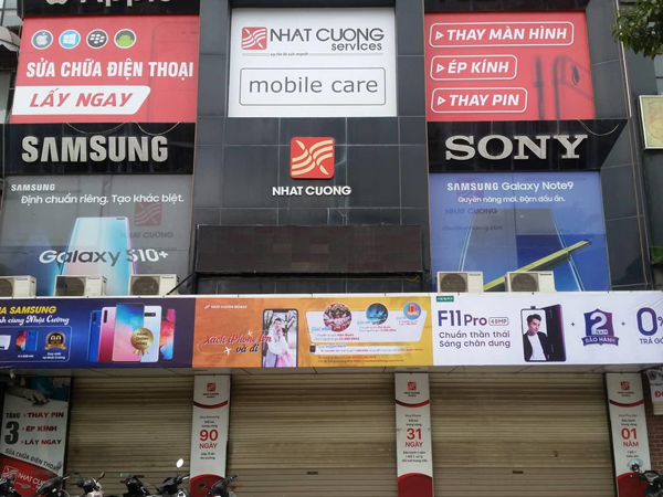 Chuỗi cửa hàng Nhật Cường Mobile đóng cửa khi bị công an khám xét