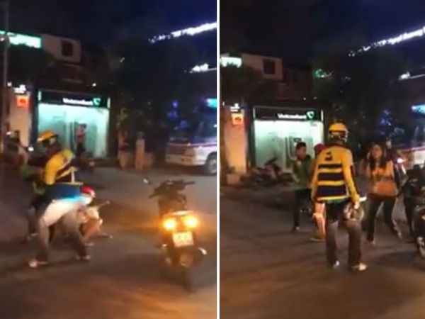 Tài xế xe ôm đánh nhau như 'phim chưởng' trên phố, 2 cô gái đi xe lao vào can ngăn