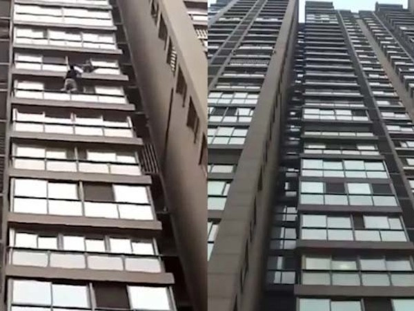 Thót tim bé trai đứng chông chênh trên gờ tường tầng 13
