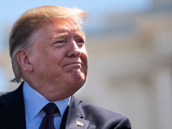 Trump nói ‘rất hạnh phúc với chiến tranh thương mại'