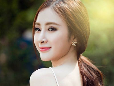Angela Phương Trinh biến hóa đa sắc giữa vườn xuân