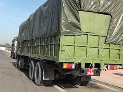 Kiểm tra xe biển đỏ chở quá tải, phát hiện biển số giả