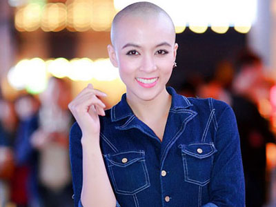 "Mỹ nhân đầu trọc" của Vietnam Idol diện đầm nữ tính, lộ hình xăm khủng