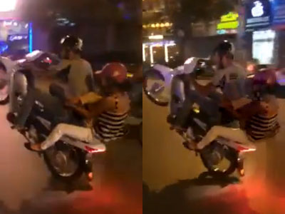 Chở theo vợ con, bốc đầu táo tợn giữa phố khiến nhiều người thót tim