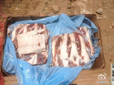 Cảnh Trung Quốc tiêu hủy hàng trăm tấn thịt đông lạnh 40 năm
