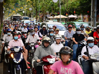 Bỏ thu phí xe máy trên toàn quốc, tại sao không?