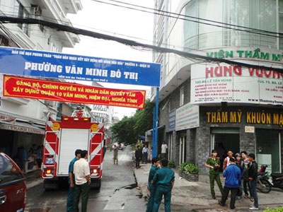 Ném đá lên thẩm mỹ viện cao 8 tầng để báo cháy