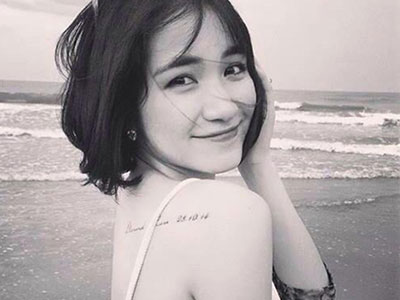 Hình xăm ở lưng Hòa Minzy hé lộ ngày yêu Công Phượng