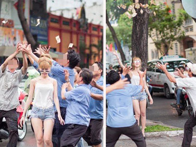 Cô gái mặc gợi cảm tung tiền "giải đen" trên phố Sài Gòn