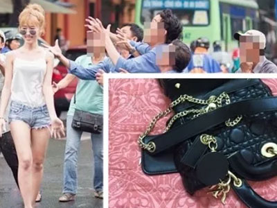 "Cô nàng vung tiền" khoe việc cắt nát túi 60 triệu đồng