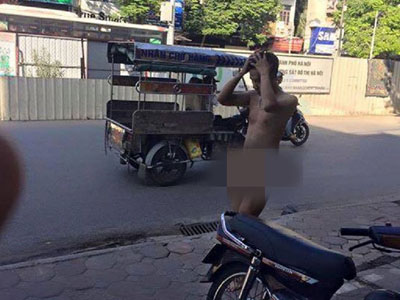 Hoảng hồn với nam thanh niên khỏa thân “dạo phố” Cầu Giấy