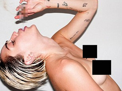 Miley Cyrus "phơi thân" trần trụi trên bìa tạp chí