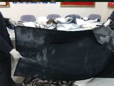 Quá cảnh qua nhiều nước với chiếc chăn tẩm đầy cocaine
