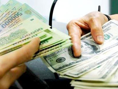Tiền đồng Việt Nam vẫn lên giá và chịu áp lực