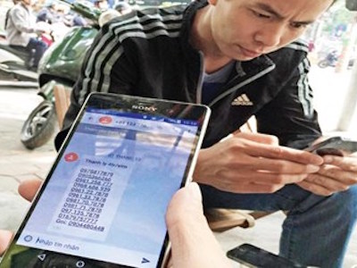 Bùng nổ tin nhắn rác, tiền vào túi ai?