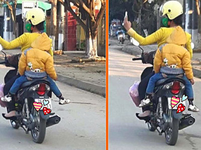 Đèo con bằng xe máy, mẹ tranh thủ chụp ảnh "tự sướng"