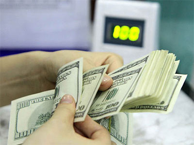 Sau Tết, NHNN tăng tỷ giá trung tâm 12 đồng