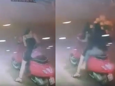 Clip: Hai thiếu nữ sành điệu, dừng xe trên đường ăn trộm chậu hoa trang trí Tết