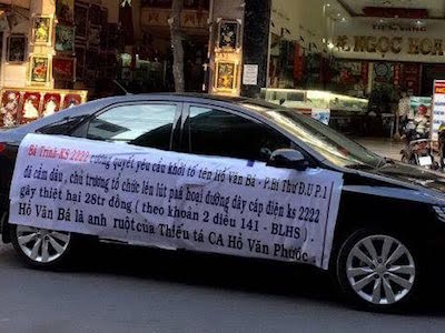 Vụ căng băng-rôn "bêu xấu" cán bộ: Trả ô tô, không xử lý hình sự