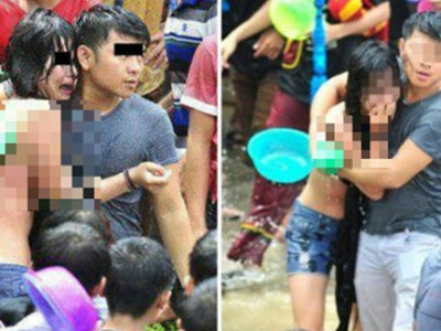 Phẫn nộ cô gái bật khóc vì bị lột tung áo trong lễ hội té nước