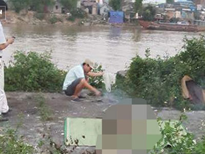Bàng hoàng phát hiện thi thể nam giới mất đầu nổi lập lờ