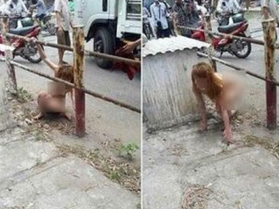 Cô gái khỏa thân đi lại trên đường phố Hà Nội đã được đưa vào trại tâm thần