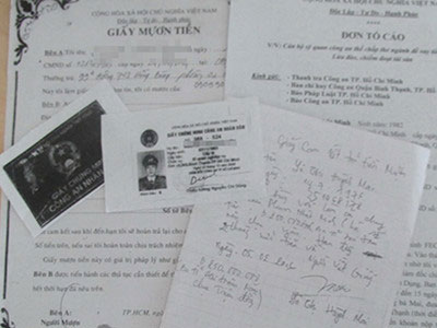 Vợ một công an gán thẻ giả của chồng vay tiền tỉ
