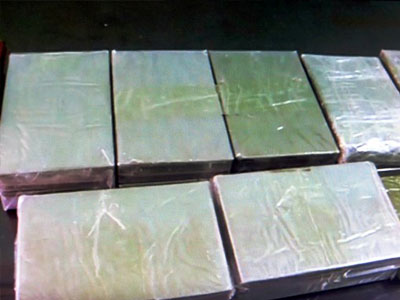 Phá đường dây ma túy trong vỏ bọc buôn gỗ, thu giữ 15 bánh heroin