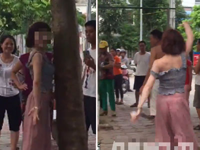 Hà Nội: Cô gái trẻ nghi ngáo đá dựng xe SH bên đường rồi nhảy múa điên loạn