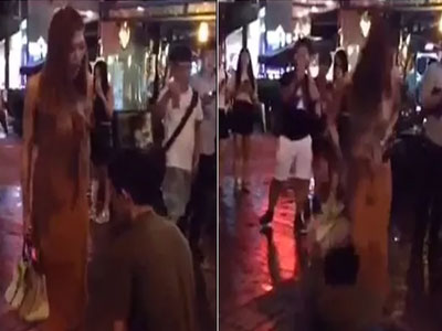 Bi hài chàng trai quỳ xin lỗi, kéo tụt cả váy người yêu giữa phố