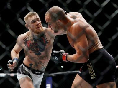 Hạ knock-out đối thủ, "gã điên" McGregor đi vào lịch sử UFC