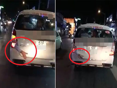 Hình ảnh rùng rợn: Cánh tay bị kẹp ở cốp xe taxi chạy trên phố Sài Gòn