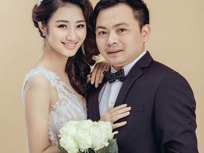 Hoa hậu Thu Ngân nép vào chồng đại gia trong ảnh cưới