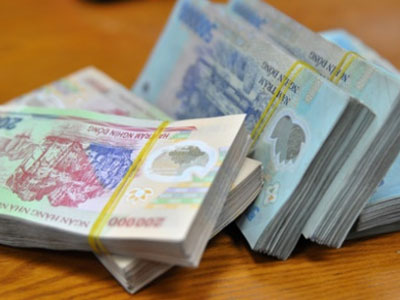 Nhận thưởng Tết, bạn phải đóng thuế bao nhiêu?