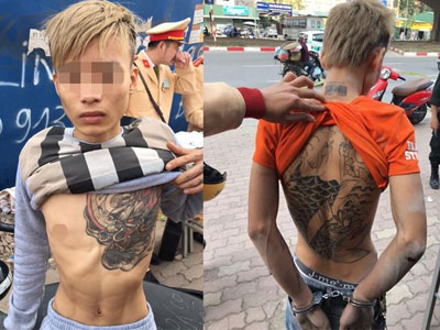 Cặp đôi tuổi teen xăm hình rồng vứt xe máy khi thấy cảnh sát