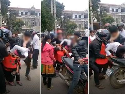 Cô gái bị kéo tuột váy vì nhóm thanh niên đi "bắt vợ" tại trung tâm chợ thị trấn Phù Yên