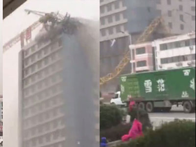 Trung Quốc: Gió mạnh thổi sập cần cẩu cao hơn tòa nhà 15 tầng