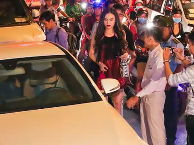 Người mẫu xin nộp phạt tại chỗ, ông Đoàn Ngọc Hải cương quyết cho cẩu xe về đồn