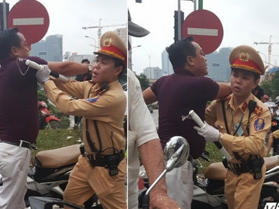 Video: Đi vào làn BRT, người trên ô tô hung hăng đánh tài xế xe máy