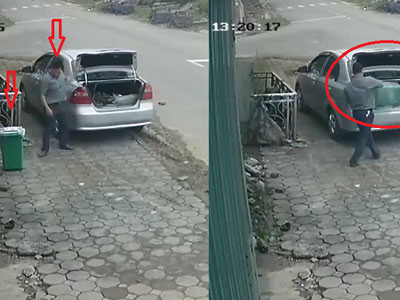 Truy tìm người đàn ông đi ô tô "cầm nhầm" thùng rác trên vỉa hè