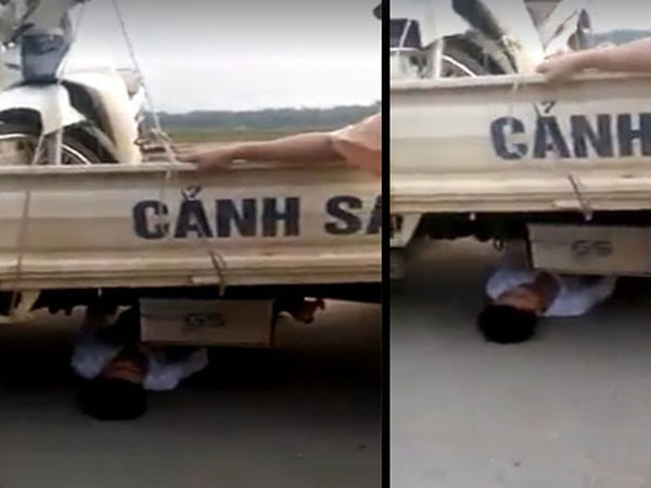 Bị tạm giữ xe do vi phạm giao thông, nam thanh niên chui vào gầm xe ôtô CSGT "ăn vạ"