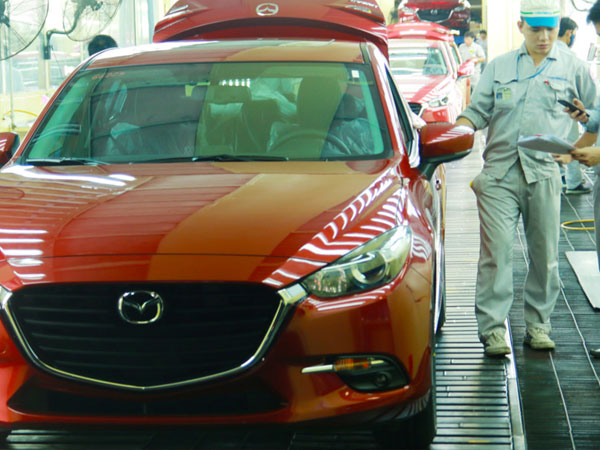 Các dòng xe ăn khách Kia, Mazda lắp ráp thế nào ở Việt Nam?