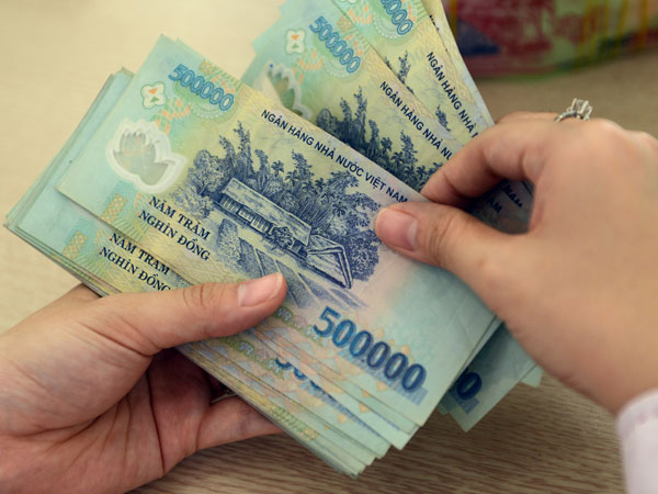 Nửa năm, mỗi nhân viên Vietcombank nhận 160 triệu đồng tiền lương
