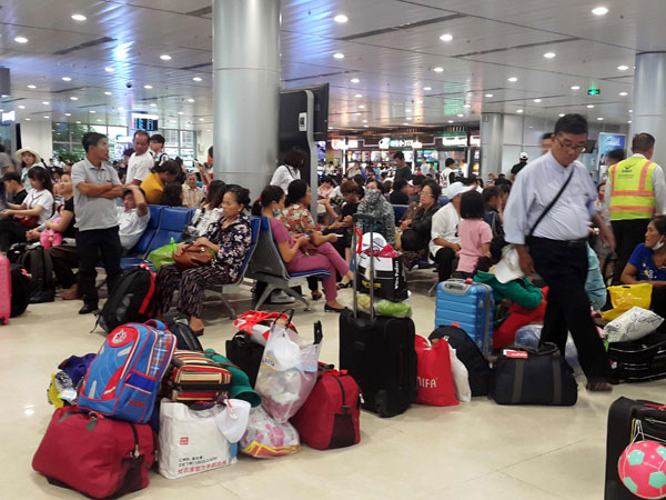 Hôm nay, 25-7, hoãn 30 chuyến bay vì bão số 4
