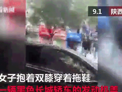Video: Chồng phóng xe bỏ đi mặc vợ ngồi trên nắp ca pô sau khi cãi nhau