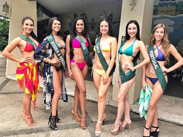 Hà Thu đọ dáng cùng thí sinh Hoa hậu Trái đất trong trang phục bikini