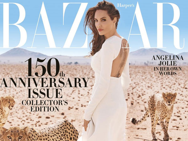 Angelina Jolie chụp hình cùng báo đốm ở châu Phi